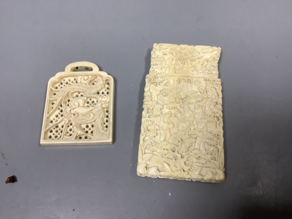 A Canton carved ivory card case (a.f.) and other ivory carvings, 19th/ early 20th century